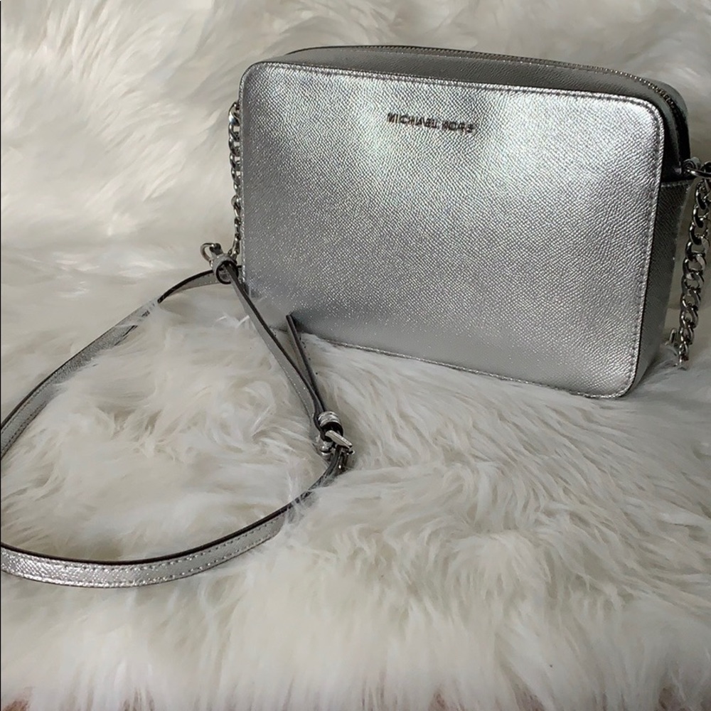 Michael Kors silver crossbody purse •